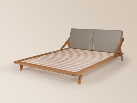 nordic space bett aus eiche massivholz von ellenberger design mit grauen rückenpolstern und lattenrost aus buche federleisten #160-W-180-W-200-W