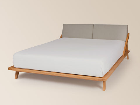 nordic space bett aus massivem eichenholz von ellenberger design mit grauem rückenpolster ab 160cm größe #160-W-180W-200-W