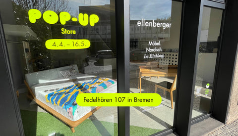 Schaufenster von ellenberger Möbel Pop-up Store in Fedelhören in Bremen mit Aufschrift Möbel. Nordisch. Im Einklang.