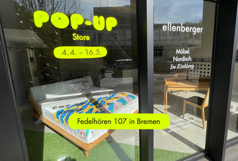 Schaufenster von ellenberger Möbel Pop-up Store in Fedelhören in Bremen mit Aufschrift Möbel. Nordisch. Im Einklang.
